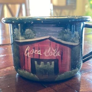 Professionally Hand painted Coca-Cola barn on small green enameled metal cup.